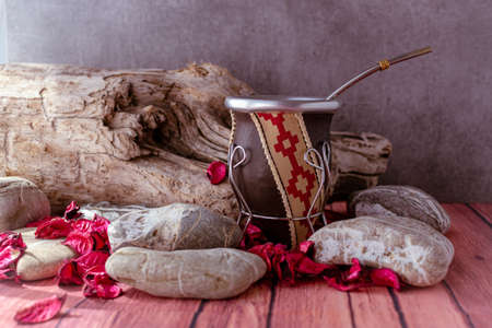 mate traditional drink of Argentina on table width natural decoration.