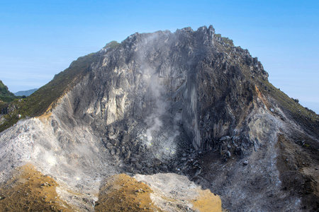 Caldera with fumaroles. Mount Sibayak volcano near Berastagi in North Sumatra, Indonesiaの写真素材