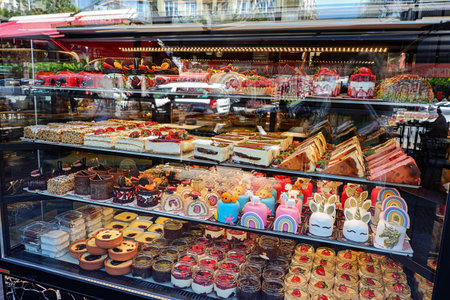 Assorted cakes in a shop-windowの写真素材