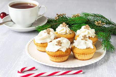Homemade cupcakes with Christmas decorationsの写真素材