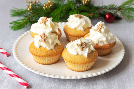 Homemade cupcakes with Christmas decorationsの写真素材
