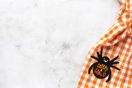 Checked tablecloth with Halloween picture on grey backgroundの写真素材