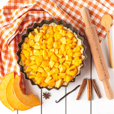Top view of a pumpkin pie baking processの写真素材