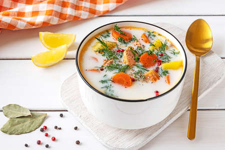 Lohikeitto, Finnish creamy salmon soup in a white bowlの写真素材