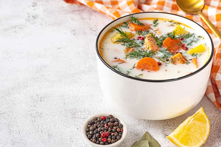 Lohikeitto, Finnish creamy salmon soup in a white bowlの写真素材