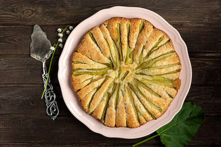 Rhubarb pie, top view on dark wooden backgroundの写真素材