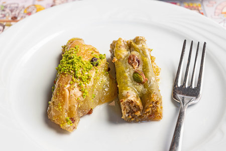 Pistachio baklava dessert on a white plateの写真素材