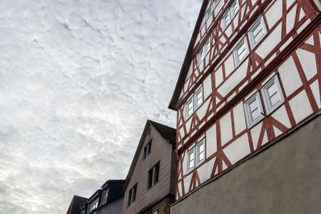 Typical german facades, low angle view with dramatic sky
