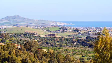 Temple of Concord with Punta Bianca on the background. Valley of Temples, Agrigentoagrigento, valley, sicily, temples, italy, temple, old, greek, architecture, concordia, culture, ancient, stone, europe, history, religion, column, symbol, style, landscapeの写真素材