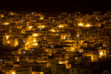 View on sicilian houses at night. Town of Cammarata, near Agrigentoの写真素材