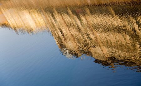 Reflection from houses in the riverの写真素材