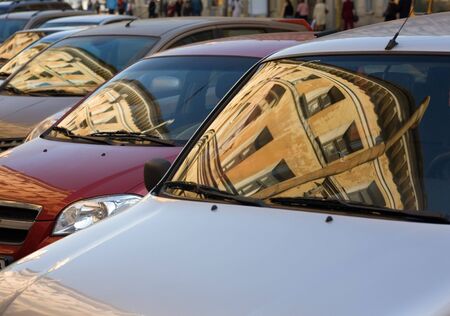 Reflection of street in a number of cars の写真素材