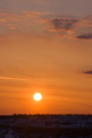 Winter sunset in rural areaの写真素材
