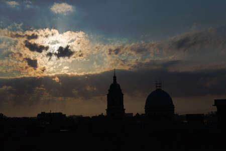 Petersburg's sunset roofs with a dome and a belltowerの写真素材