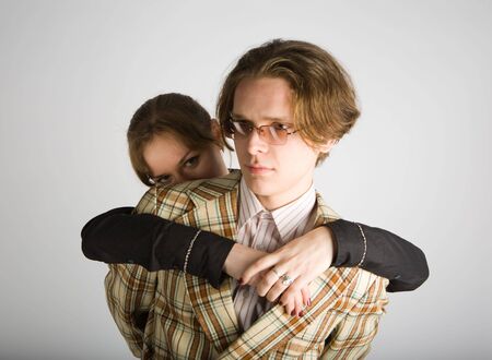 Young pair portrait in studioの写真素材