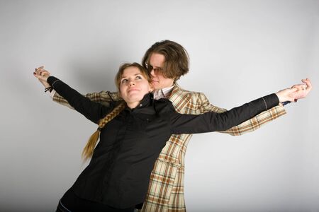 The man and the young woman have together stretched handsの写真素材