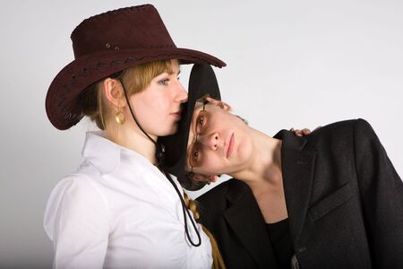 The man has put a head on a shoulder of the young womanの写真素材