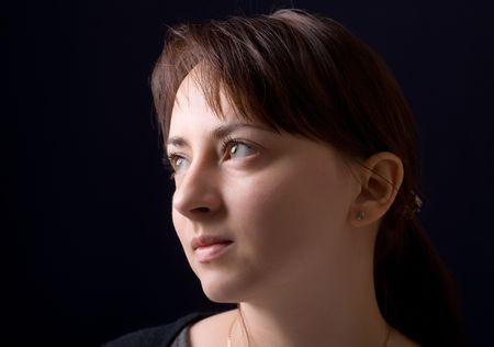 Female portrait on a black backgroundの写真素材