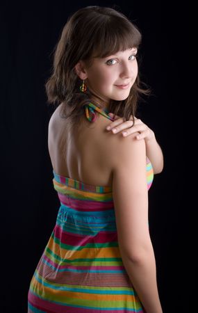 Portrait of the beautiful girl in a half-turnの写真素材