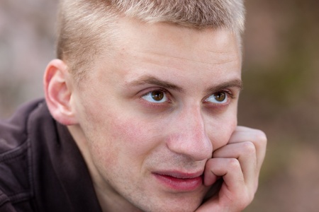 Portrait of the listening intently man close upの写真素材