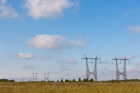Landscape with an electric main in countrysideの写真素材