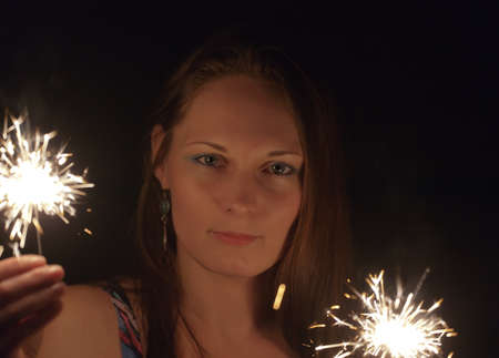 Portrait of the girl by the light of Bengal fires