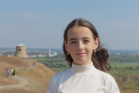 portrait of the girl against the ancient city of Yelabuga, Russia