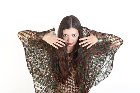 the sensual girl in a poncho, isolated on whiteの写真素材