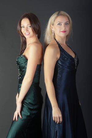portrait of two girls in evening dressesの写真素材