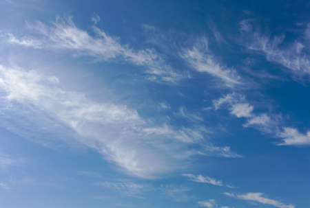 Abstract day sky background with white clouds