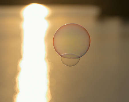 big bubble closeup on a background of a sunset