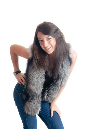 cheerful girl with fur, isolated on whiteの写真素材
