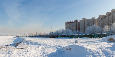 residential area on the banks of the river in winter dayの写真素材
