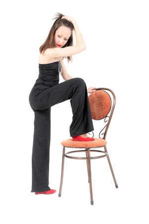 studio portrait of a girl in black clothesの写真素材