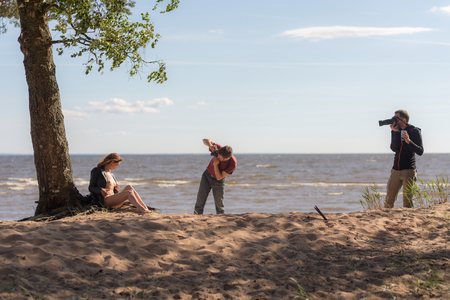 summer erotic photo shoot at the beachの写真素材