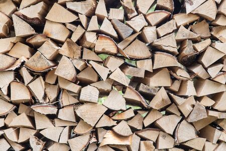 stack of wood from birch logs close upの写真素材