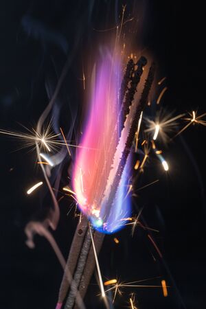 bright flames and sparks on a black background
