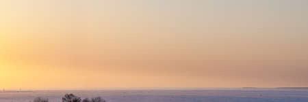 panorama of a winter sunset over the bayの写真素材