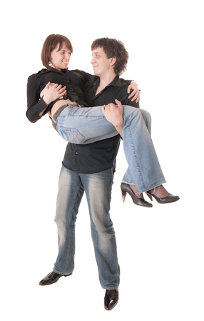 studio portrait of a young couple, isolatedの写真素材