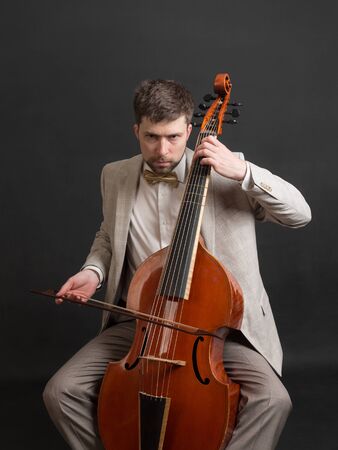 Portrait of a man playing the viola da gamba