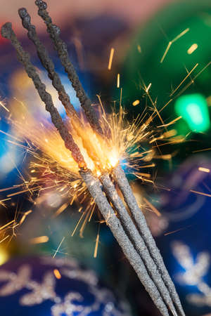 sparks on the background of Christmas toys