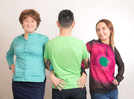 friendly portrait of a man and two womenの写真素材