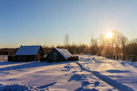 dawn in the village on a cold winterの写真素材
