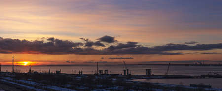 View of the construction site on the beach at sunsetの写真素材