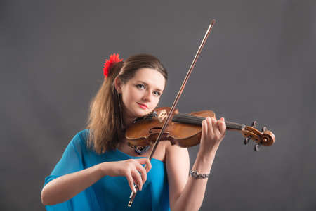 Portrait of a girl with a violinの写真素材