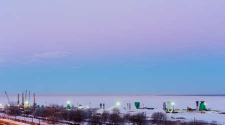 cold winter morning over the bay and the construction site