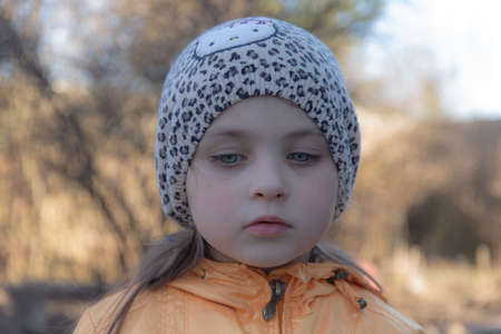 portrait of a pensive little girl closeupの写真素材