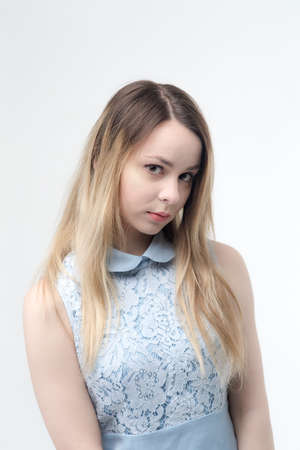 portrait of a girl in a blue dress
