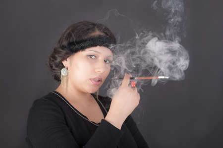 portrait of a girl with a cigaretteの写真素材