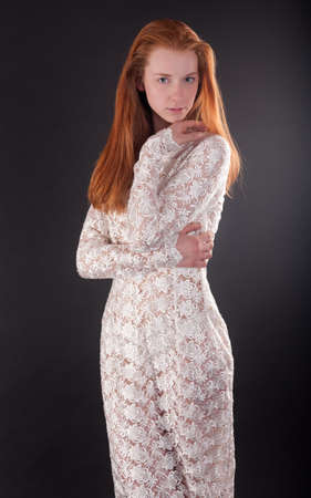 portrait of a slender sensual girl in white dressの写真素材